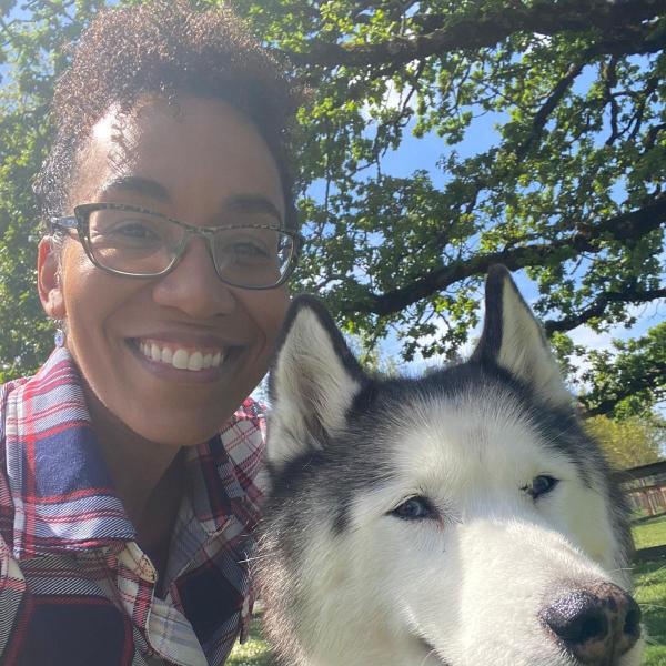 Photo of Thandeka Ngwenyama with dog