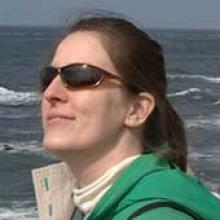 Portrait of Karen Shell in front of the ocean